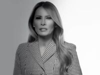 Melania Trump in a houndstooth blazer speaks to the camera to promote her new memoir.