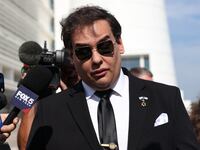 WEST ISLIP, NEW YORK - AUGUST 19: Former U.S. Rep. George Santos gives a statement after a court hearing on August 19, 2024 in West Islip, New York. Santos pleaded guilty to wire fraud and aggravated identity theft weeks before his federal trial was set to begin. His sentencing has been scheduled for February 7, and he faces more than six years in prison under federal sentencing guidelines. Santos owes at least $370,000 in restitution. He was expelled from Congress in 2023, becoming the sixth member in the chamber’s history to be ousted by colleagues. (Photo by Michael M. Santiago/Getty Images)