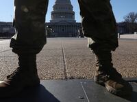 2021-03-04T021453Z_802036633_RC224M9D2WYG_RTRMADP_3_USA-CAPITOL-SECURITY_c8oiho