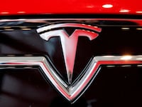 2023-05-12T172947Z_1458295014_RC24X0ABCFFB_RTRMADP_3_TESLA-LAWSUIT_eav6a3