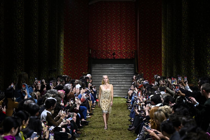 The audience pulled out their phones as Gillian Anderson closed the Fall/Winter 2026-2027 show at Miu Miu during Paris Fashion Week.