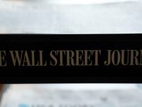 Copies of The Wall Street Journal newspaper
