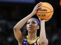 Angel Reese #10 of the LSU Tigers shoots the ball during the first half against the Iowa Hawkeyes in the Elite 8 round of the NCAA Women's Basketball Tournament at MVP Arena on April 01, 2024 in Albany, New York.