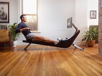 Man using Hydrow Pro Rower by Hydrow