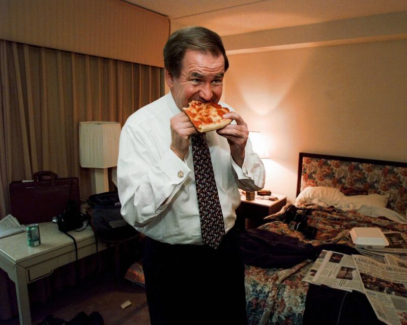 galleries/2011/09/20/herman-cain-sarah-palin-and-more-politicians-eating-pizza-photos/pols-pizza-buchanan_jlxtwh