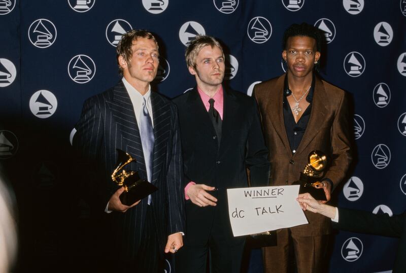 American Christian rap and rock band DC Talk at the 1997 Grammy Awards. The trio won the Best Rock Gospel Album award for their album 'Jesus Freak'.