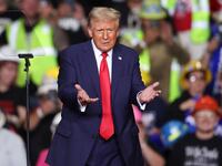 Donald Trump gestures after speaking at a campaign rally in Pittsburgh.