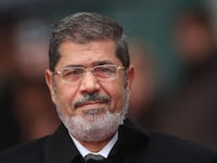 articles/2013/11/04/from-president-to-prisoner-mohamed-morsi-s-trial-starts-in-egypt/131103-salama-morsi-tease_plqc0p