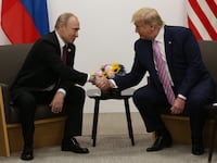 U.S. President Donald Trump greets Russian President Vladimir Putin during their bilateral meeting at the G20 Osaka Summit 2019, in Osaka, Japan.