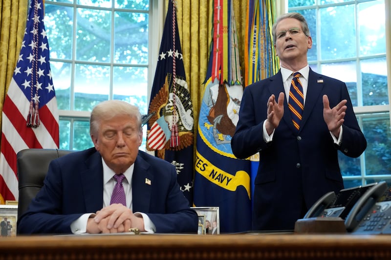 U.S. Treasury Secretary Scott Bessent speaks alongside President Donald Trump