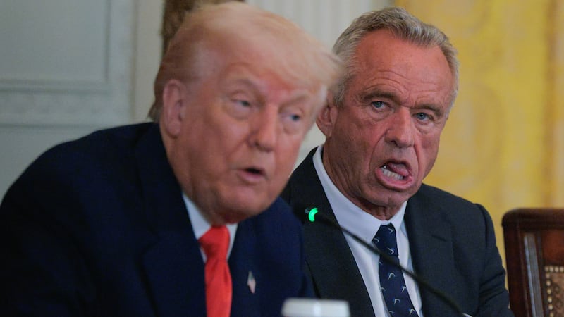 WASHINGTON, DC - MAY 22: U.S. President Donald Trump and Health and Human Services Secretary Robert F. Kennedy Jr. attend an event introducing a new Make America Healthy Again Commission report in the East Room of the White House on May 22, 2025 in Washington, DC. The commission, which is tasked with studying the potential causes for the "childhood chronic disease crisis," recommends reassessing the nation’s childhood vaccine schedule, scrutinizing ultra-processed foods and studying pesticides used in commercial farming. The Trump administration has proposed a FY2026 budget of $94 billion for the Department of Health and Human Services -- a reduction of about 26-percent from the 2025 level -- cutting programs and staff at the National Institutes of Health and the Centers for Disease Control and Prevention. (Photo by Chip Somodevilla/Getty Images)