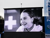 Cyclist Muriel Furrer shown on screen at the CI Paracycling and Road World Championships