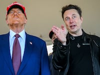 BROWNSVILLE, TEXAS - NOVEMBER 19: Elon Musk speaks with U.S. President-elect Donald Trump as they watch the launch of the sixth test flight of the SpaceX Starship rocket on November 19, 2024 in Brownsville, Texas.