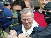 2006-04-12T120000Z_347669484_GM1DSJFEGMAA_RTRMADP_3_ITALY-MAFIA-ARREST_mocduz