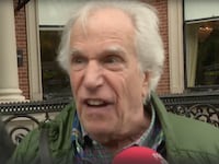 Henry Winkler speaks to the media after being evacuated from a hotel in Dublin, Ireland during a fire.