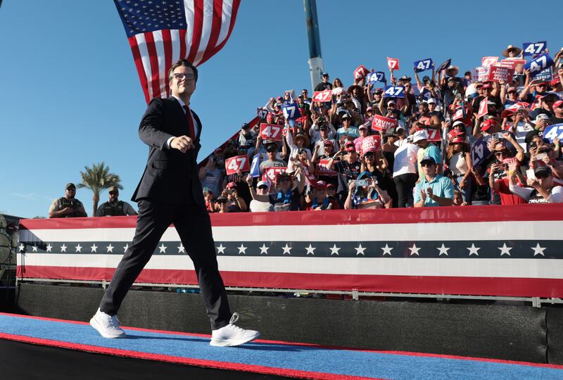 Matt Gaetz walks on stage during a rally in Coachella, California.