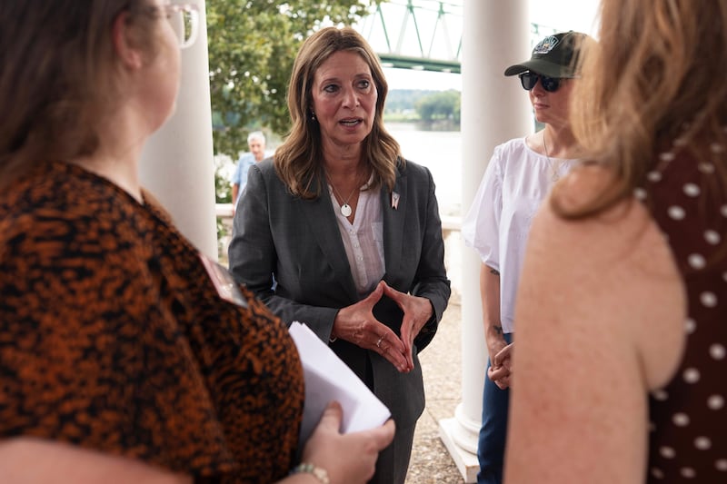 Democratic gubernatorial candidate Dr. Amy Acton speaks with supporters during a campaign event along the Ohio River, in Marietta, Ohio, Thursday, Sept. 17, 2026.