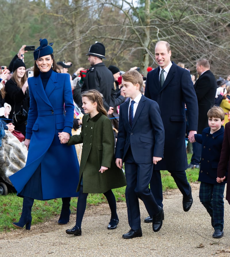 Princess Kate wore the same hat and coat at the Christmas Morning Service at Sandringham Church in 2023. Pictured with Princess Charlotte of Wales, Prince George of Wales, Prince William, Prince of Wales, and Prince Louis of Wales.