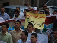 articles/2013/05/03/desperate-to-go-to-war-syrians-in-egypt-find-an-ally-to-help/130502-Syrians-Egypt-tease_vk3yvn
