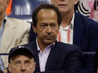 Hedge Fund manager John Paulson attends the men's singles final match of the U.S. Open in New York