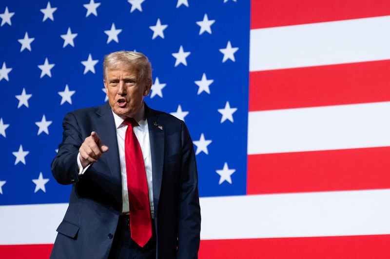 TOPSHOT - US President Donald Trump departs after addressing senior military officers gathered at Marine Corps Base Quantico in Quantico, Virginia, on September 30, 2025. Defense Secretary Pete Hegseth said Tuesday the US military must fix "decades of decay" as he addressed a rare gathering of hundreds of senior officers summoned from around the world to hear him speak near Washington. (Photo by Jim WATSON / AFP) (Photo by JIM WATSON/AFP via Getty Images)