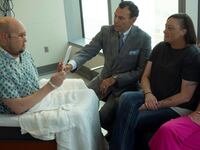 Aaron James looks at his face for the first time after receiving a whole eye transplant.