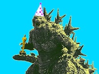 Photo illustration of Godzilla with a party hat holding an Oscar on a blue background.