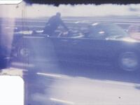 John F. Kennedy's limousine driving to Parkland Memorial Hospital.