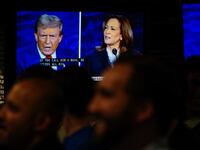 People watch the presidential debate between Republican presidential nominee Donald Trump and Democratic presidential nominee Kamala Harris at a watch party in New York City on September 10, 2024.