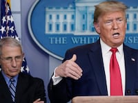 Dr. Anthony Fauci (L), and U.S. President Donald Trump.