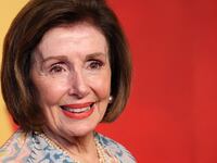 Nancy Pelosi smiles on the red carpet at the Vanity Fair afterparty following the 96th Academy Awards.