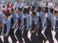 Members of Synanon marching in “Born in Synanon” documentary.