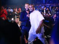LOS ANGELES, CA - AUGUST 30: Recording artists John Legend (L) and Kanye West attend the 2015 MTV Video Music Awards at Microsoft Theater on August 30, 2015 in Los Angeles, California. (Photo by Christopher Polk/MTV1415/Getty Images)
