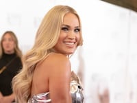 A photo of Carrie Underwood on a red carpet