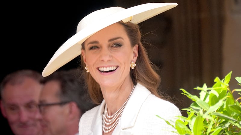 Kate Middleton smiles as she attends the Order of the Garter service at St George's Chapel in Windsor Castle.