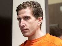 Bryan Kohberger, the man accused of killing four college students in Idaho, stares forward as he appears for court in May.