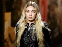 Gigi Hadid walks the runway at the Chanel fashion show in Paris