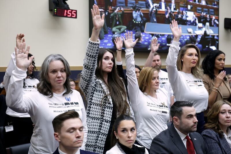 WASHINGTON, DC - FEBRUARY 11: Jeffrey Epstein abuse survivors stand in the audience as U.S. Attorney General Pam Bondi testifies before the House Judiciary Committee in the Rayburn House Office Building on February 11, 2026 in Washington, DC. Bondi is expected to face questions on her department’s handling of the files related to the convicted sex offender Jeffrey Epstein, President Trump’s investigations into political foes and the handing of the two fatal ICE shootings of U.S. citizens. (Photo by Alex Wong/Getty Images)