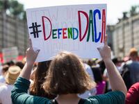 Demonstrators march during a demonstration in response to the Trump Administration's announcement that it would end the Deferred Action for Childhood Arrivals (DACA) program