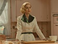 Brie Larson standing in a kitchen in 'Lessons in Chemistry'