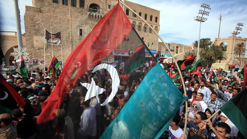 articles/2011/10/20/muammar-gaddafi-s-death-shouldn-t-be-cheered-until-clan-all-rounded-up/gaddafi-mission-accomplished-dehghanpisheh_jqrhpi