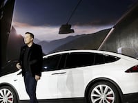 articles/2015/09/30/tesla-builds-a-car-to-survive-the-coming-apocalypse/150930-strochlic-tesla-tease_wv6jzu