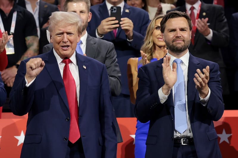 Donald Trump (L) and J.D. Vance appear on the first day of the Republican National Convention at the Fiserv Forum on July 15, 2024 in Milwaukee, Wisconsin.