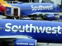 BALTIMORE, MARYLAND - OCTOBER 11: A Southwest Airlines airplane taxies from a gate at Baltimore Washington International Thurgood Marshall Airport on October 11, 2021 in Baltimore, Maryland. Southwest Airlines is working to catch up on a backlog after canceling hundreds of flights over the weekend, blaming air traffic control issues and weather. (Photo by Kevin Dietsch/Getty Images)
