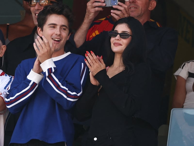US actor Timothee Chalamet (C), French journalist Marc Chalamet (L) and US Media personality Kylie Jenner attend the 2026 World Cup football tournament final match between Spain and Argentina at the New York/New Jersey Stadium in East Rutherford on July 19, 2026. (Photo by FRANCK FIFE / AFP via Getty Images)