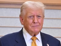 U.S. President Donald Trump poses for a photo with Japanese Emperor Naruhito at the Imperial Palace