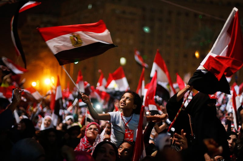 galleries/2013/07/03/morsi-out-egypt-errupts-photos/130703-egypt-reax1_nkzggp