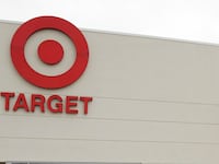 Target Corporation shareholders leave the annual shareholders meeting following a vote to keep the current Target board members at a new Target store in Waukesha, Wisconsin May 28, 2009.