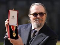 WINDSOR, ENGLAND - SEPTEMBER 30: Sir Gary Oldman poses after being made a Knight Bachelor at an investiture ceremony at Windsor Castle on September 30, 2025 in Windsor, England. (Photo by Andrew Matthews-WPA Pool/Getty Images)