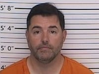 San Francisco 49ers owner Jed York poses for a police booking photo after his arrest on August 23, 2026 in Libson, Ohio.